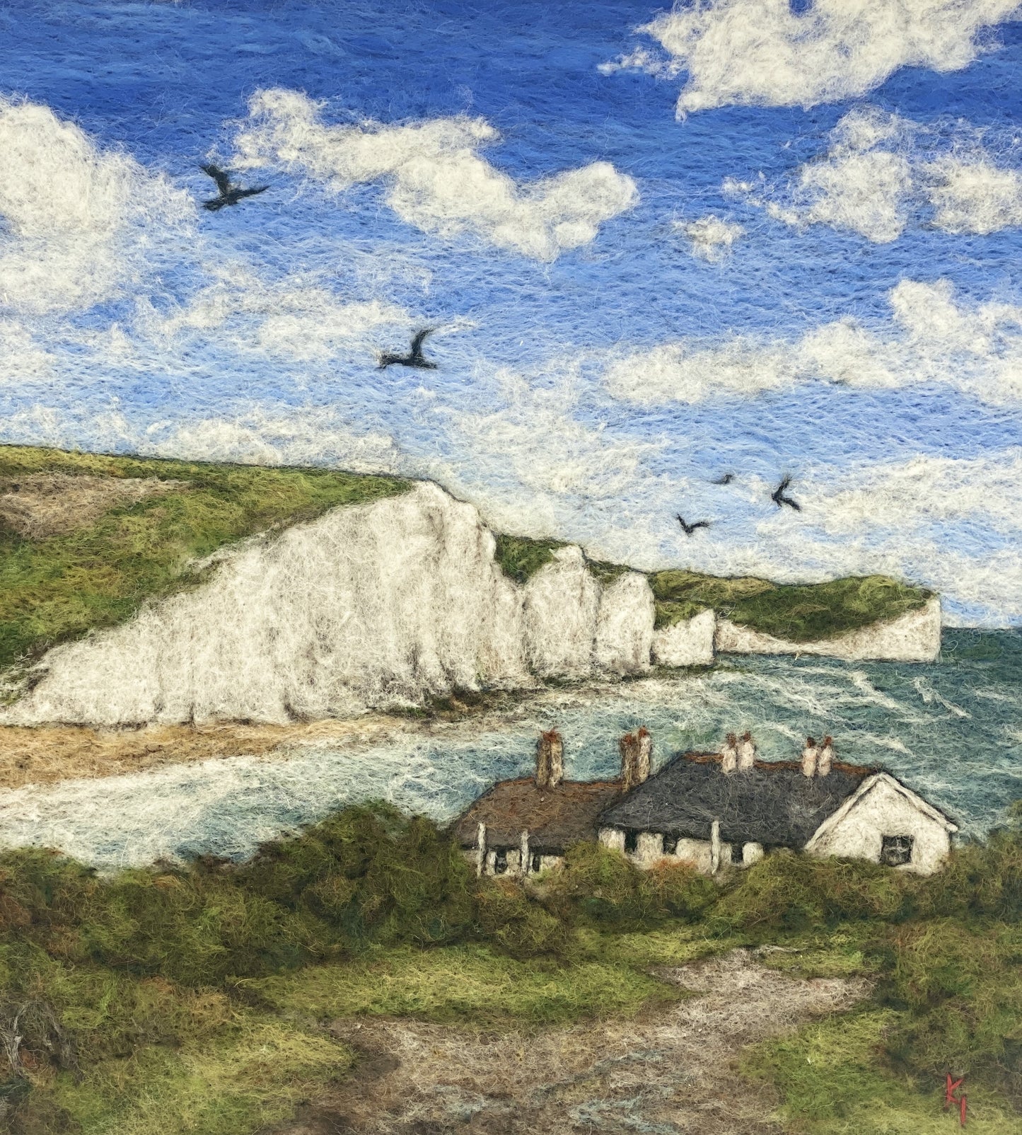 needle felted picture in a white wooden box frame, of a view of Cuckemere Haven and the Seven Sisters cliffs