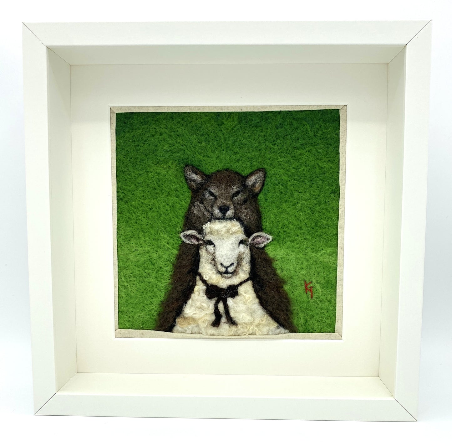 a needle felted portrait of a sheep in a wolf costume with a green background