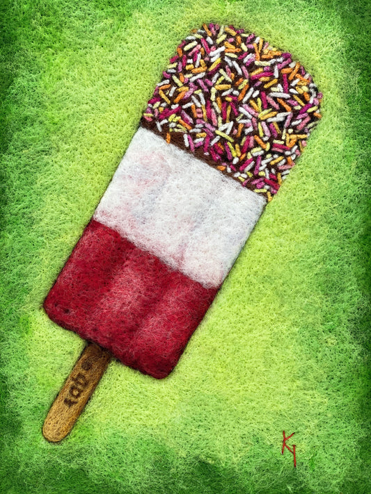 needle felted picture of a Fab ice lolly on a bright green background