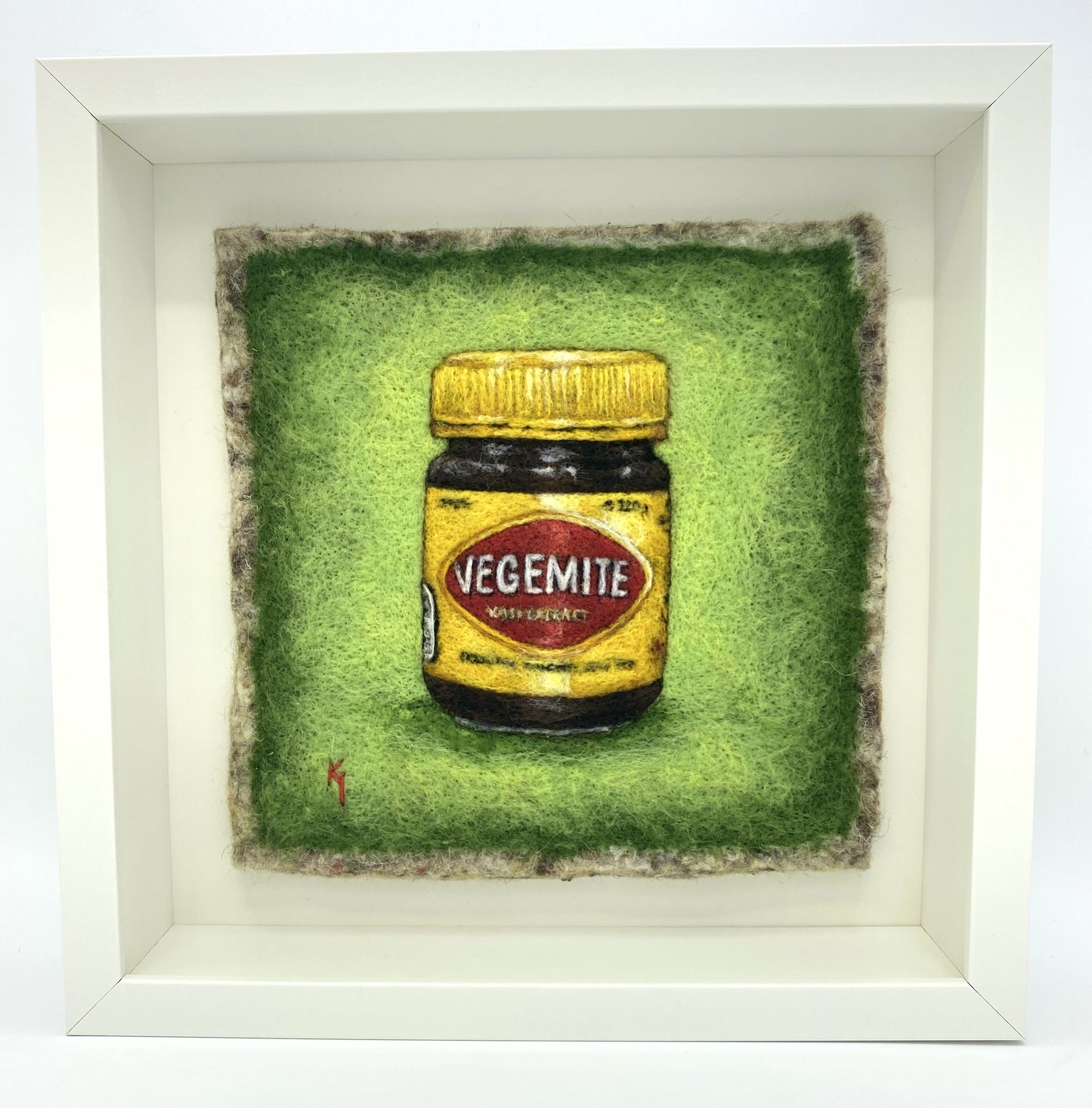 needle felted framed picture of a pot of Vegemite on a green background