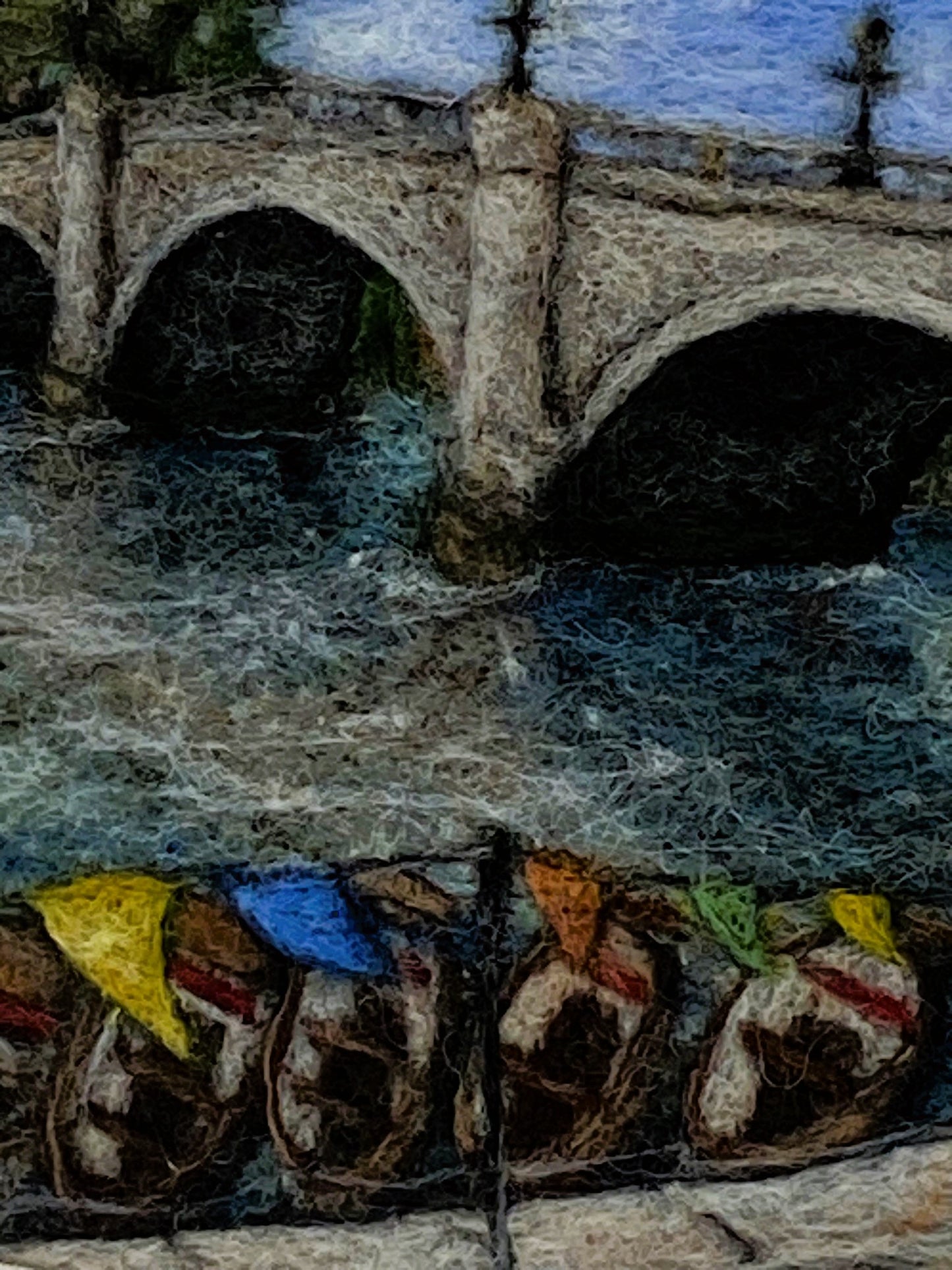 a box-framed, needle felted wool fibre picture of Ricmond Bridge showing the boats moared on the river, the bridge, trees, lamp posts and colourful bunting