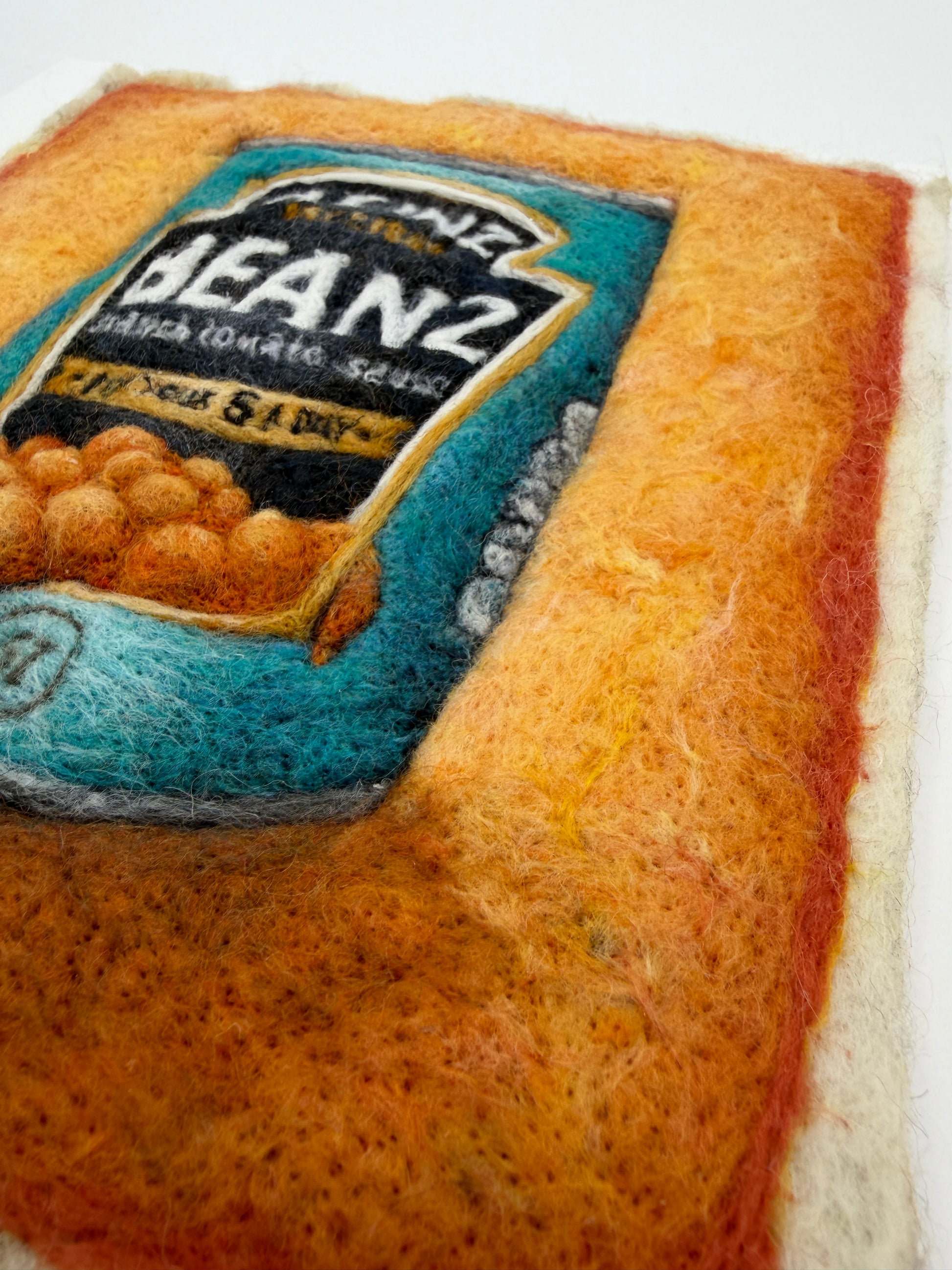 Needle felted framed picture of a tin of Heinz Baked Beans