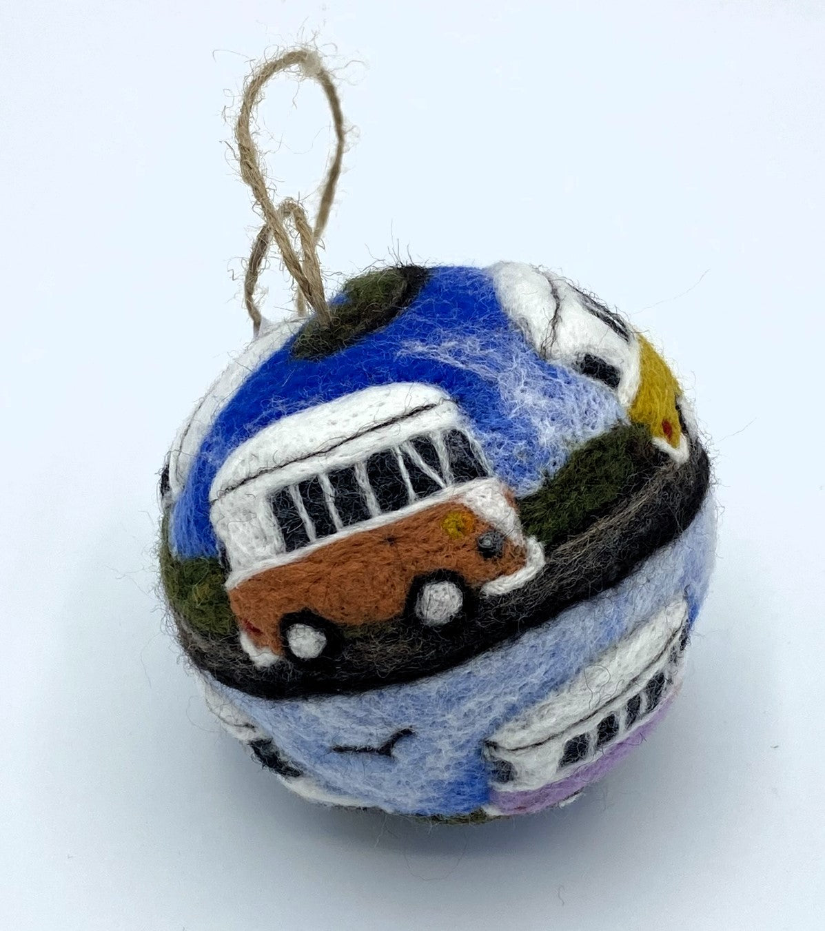 needle felted bauble depicting a convoy of seven VW style camper vans in a rainbow of colour, spiralling across the surface