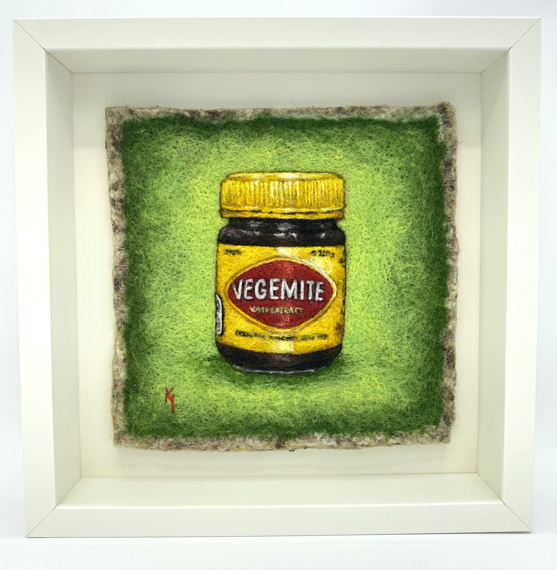 needle felted framed picture of a pot of Vegemite on a green background