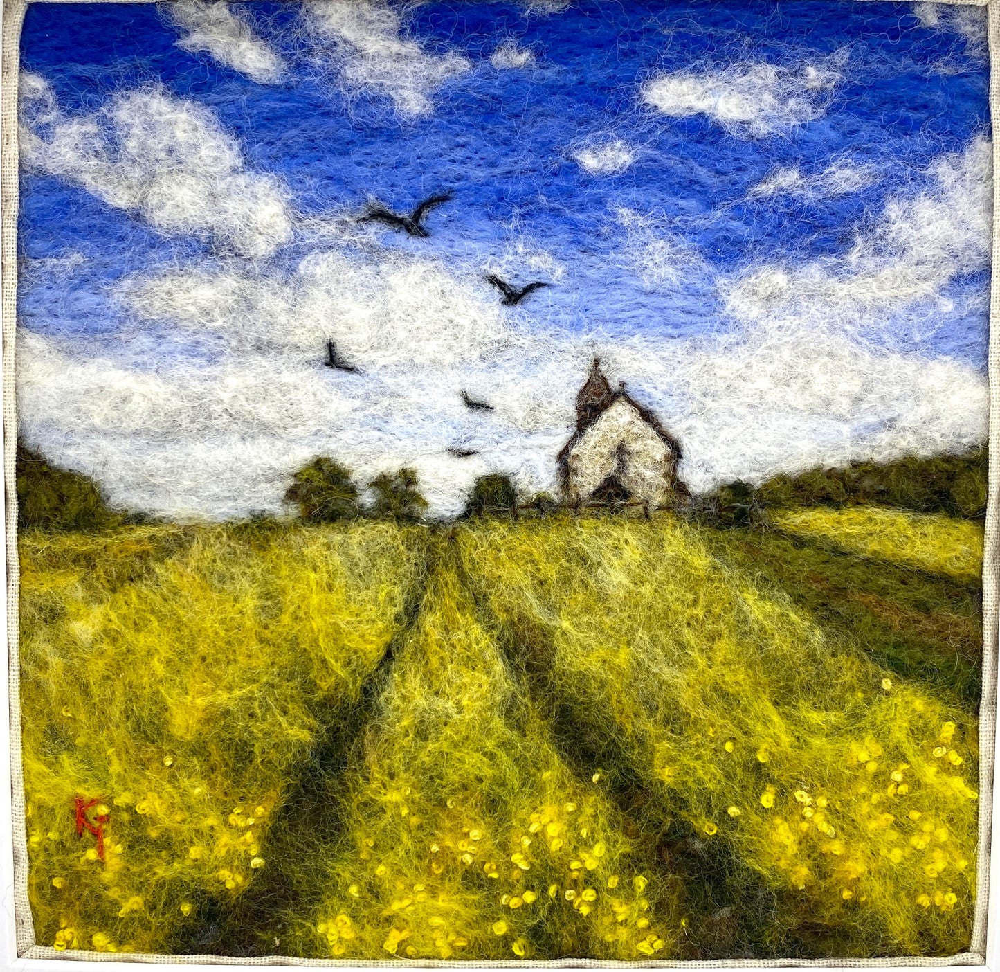 Field of yellow flowers with a church and birds flying in the sky